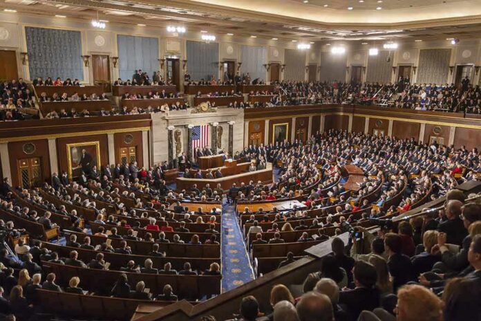 492045133 featured image People seated in a large governmental assembly hall