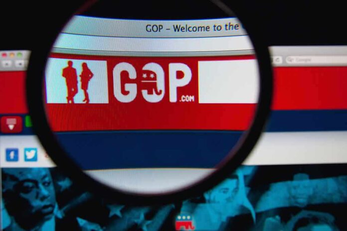 Magnifying glass on GOP website logo on screen