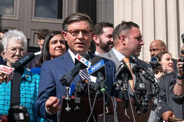 2453730387 featured image Group of people giving a press conference outside.