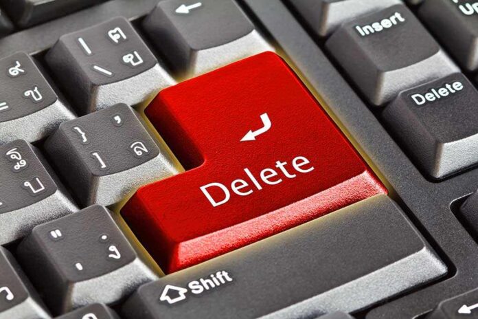 77868673 featured image Close-up of a keyboard with red "Delete" key.