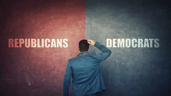 1624311322 featured image Person choosing between Republicans and Democrats.