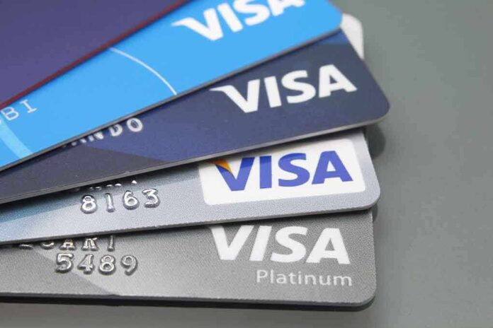 1699083310 featured image Stacked Visa credit cards in various colors