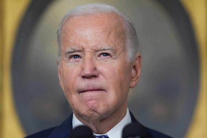 2490182217 featured image Man in suit speaking at a podium.