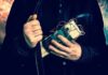 Person holding a homemade explosive device