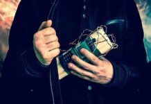 Person holding a homemade explosive device