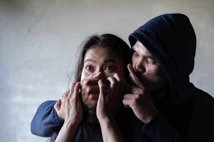 1381990856 featured image Man holding woman's mouth gesturing silence