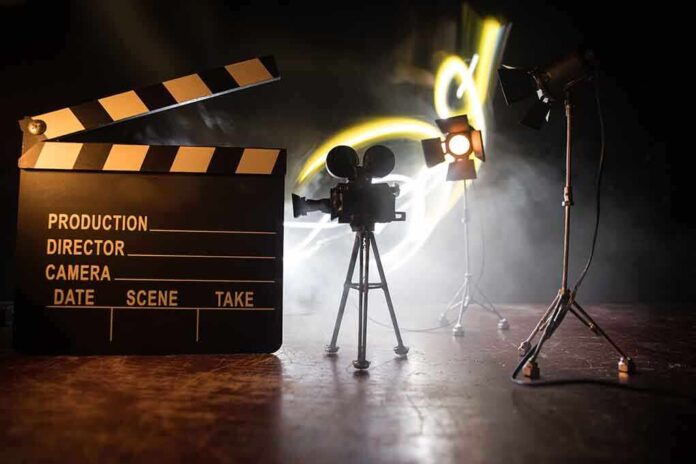 Film set with clapperboard camera and lighting
