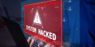Warning sign System Hacked on laptop screen