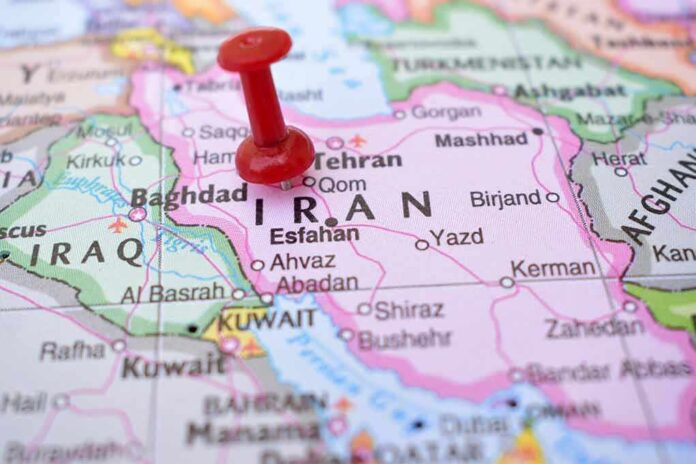 2237379503 featured image Red pushpin marking Iran on a map