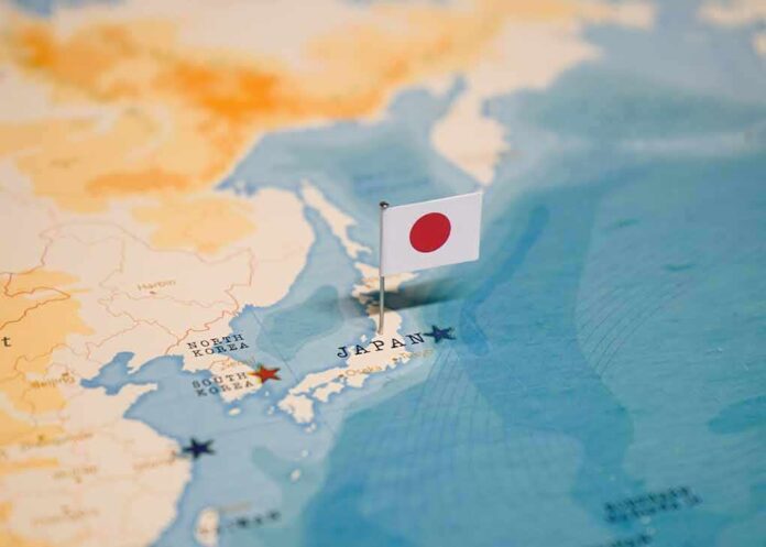 2327414549 featured image Map of Japan with flag pin placed nearby