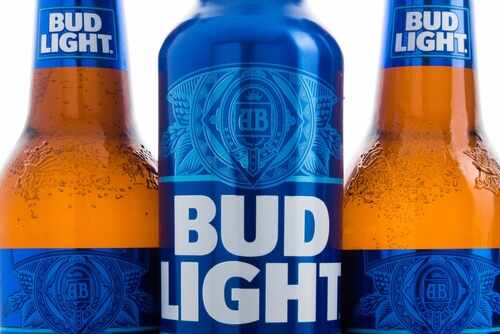 Bud Light_2194179531.jpg featured image Three Bud Light bottles and can close up