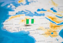 Flag pin marking Nigeria on Africa map