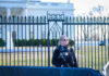 Secret Service agent stands guard outside the White House