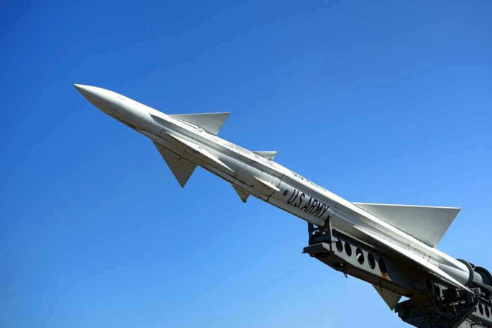 190114949 missile against a clear blue sky
