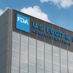 FDA Chaos—Natural Dye Sparks Industry UPROAR FDA building with blue logo and sky background