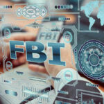 HORROR Unfolds: FBI Raids Top Gym Coach FBI text surrounded by digital security graphics and hands
