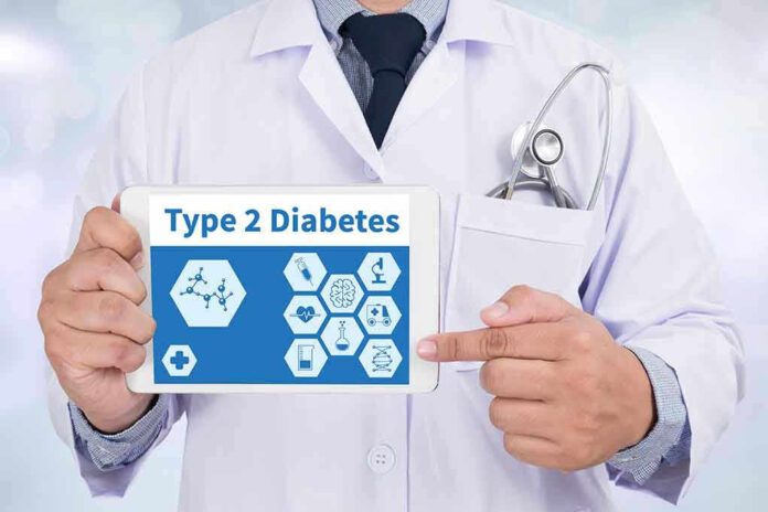 Doctor holding tablet displaying Type 2 Diabetes information