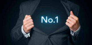 Man opening suit to reveal glowing number one