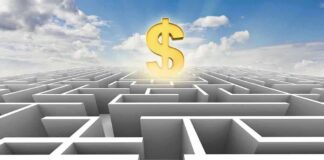 A man in a suit standing at the entrance of a maze with a dollar sign above