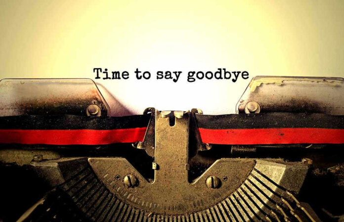 531209353 Typewriter with Time to say goodbye text.