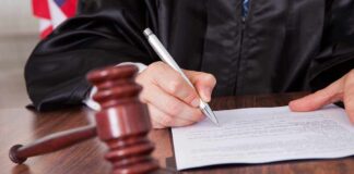 A judge signing