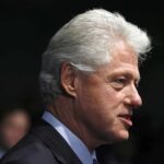 Congress Targets Clintons in Epstein Investigation Profile portrait of a man with gray hair in formal attire