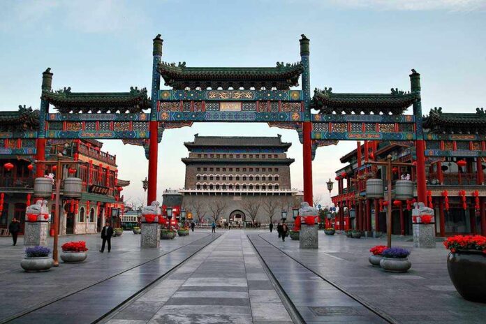 A vibrant traditional Chinese gateway with ornate decorations in an urban setting