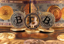 Bitcoin coins and bills displayed closely.
