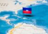 Map of the Caribbean with a flag of Haiti pinned on it