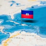 Cuba’s Drone Ambitions: Threat to U.S.? Map of the Caribbean with a flag of Haiti pinned on it