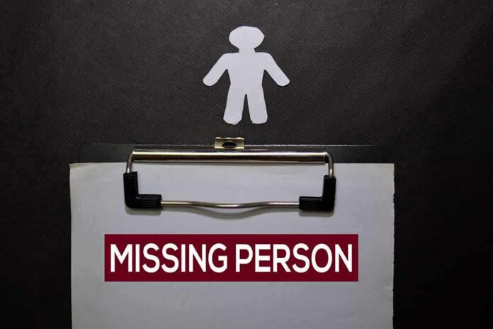 shutterstock_1612428016 (3).jpg Clipboard with a missing person notice and a paper cutout figure