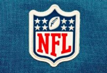 QB Dart Smeared: ‘Racist’ for Trump Intro? NFL logo patch on a blue background