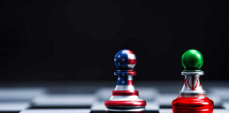 Chess pieces with USA and Iran flags on board.
