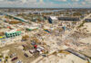 Terrifying Quake Footage — Buildings Drop Aerial view of hurricane-damaged buildings and debris.