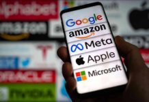 Foldable iPhone Price Shock Looms Hand holding phone displaying tech company logos