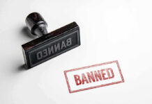 Candy Shake-Up: Two M&Ms Vanish Banned stamp and rubber stamp on white background.