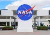 Moon Promise Downgraded — What Changed? NASA logo displayed prominently at a visitor center