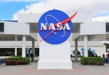 Moon Promise Downgraded — What Changed? NASA logo displayed prominently at a visitor center