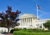 GOP Nemesis Entangled In National Secrets Case Supreme Court building with American flag and surrounding greenery