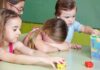 Weaponized CPS: Transportation Secretary Targeted Children at a table with building blocks, one child appears upset