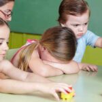 Weaponized CPS: Transportation Secretary Targeted Children at a table with building blocks, one child appears upset