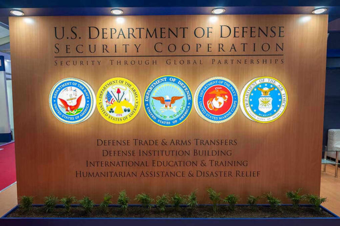 1283770690 U.S. Department of Defense Security Cooperation display with logos.