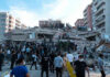 Buried Eight Days—He Still Walked Out People at a collapsed building after an earthquake.