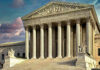 Graham’s Seat Triggers Border Showdown Building with columns and statues in front of entrance.