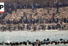 Deadly Rush Shocks Spain’s Enclave Thousands of migrants swim around the border from Morocco into Ceuta, Spain