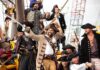 Pirate Comeback Threatens Global Trade Group of pirates celebrating on a ship