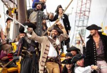 Pirate Comeback Threatens Global Trade Group of pirates celebrating on a ship