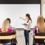 Fourth Of July Post, Sudden Suspension A teacher presenting to students in a classroom
