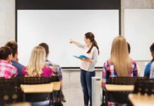 Fourth Of July Post, Sudden Suspension A teacher presenting to students in a classroom