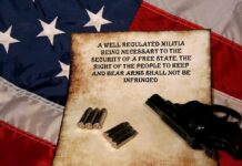 Court Twist Reshapes Gun Limits A revolver and bullets placed on an aged document with the Second Amendment text, set against an American flag background